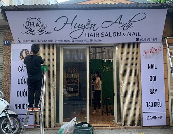 biển quảng cáo tóc và móng